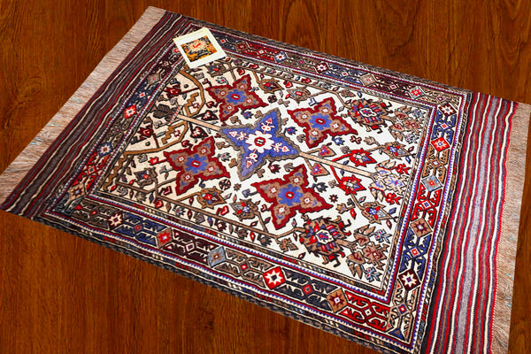 Hand knotted afghan woolen rug.